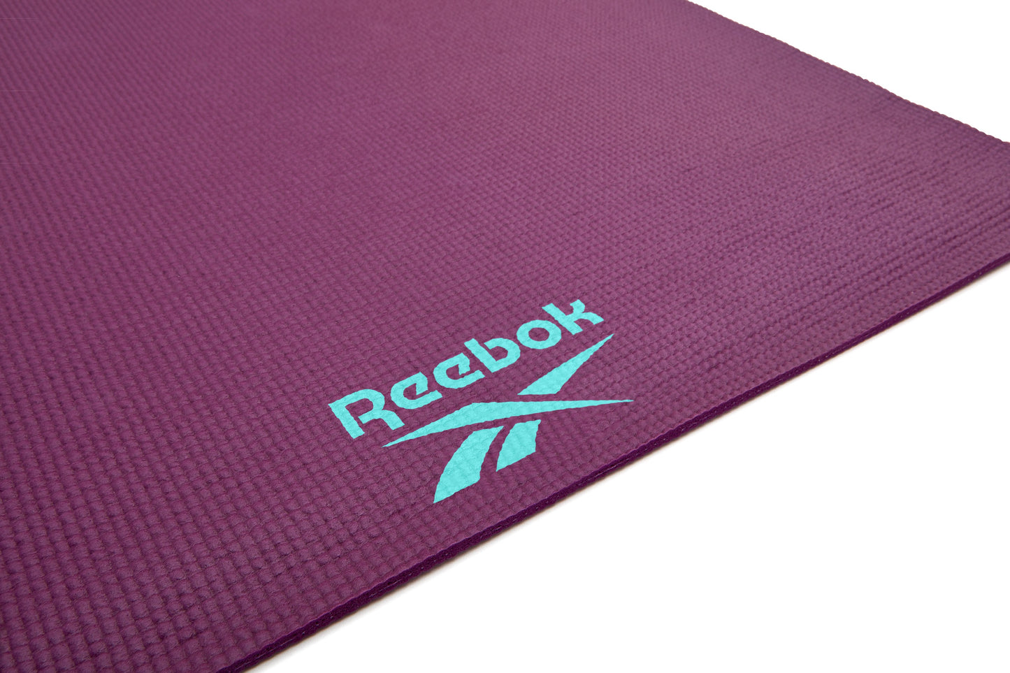 mat para yoga de doble cara reebok 4 mm morado
